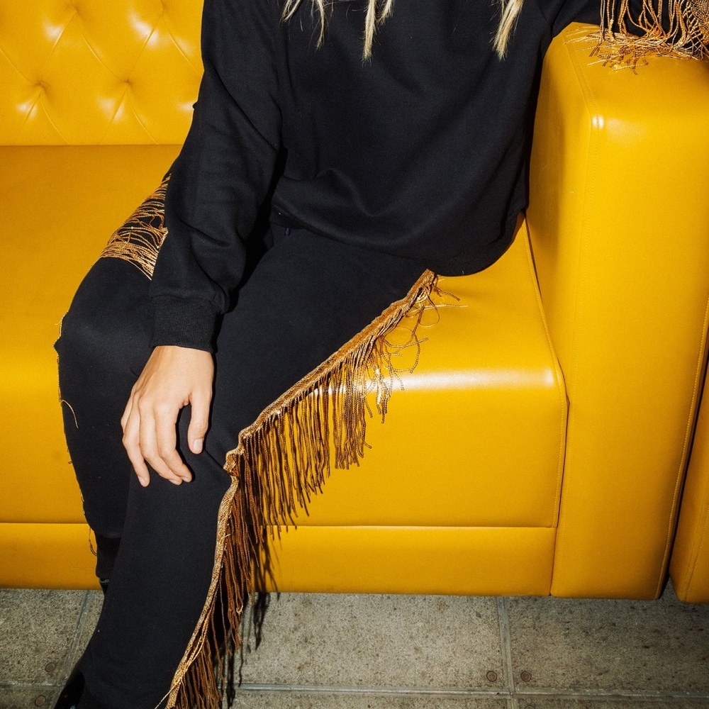 QUEEN OF SPARKLES Black Track Pants with Gold Fringe